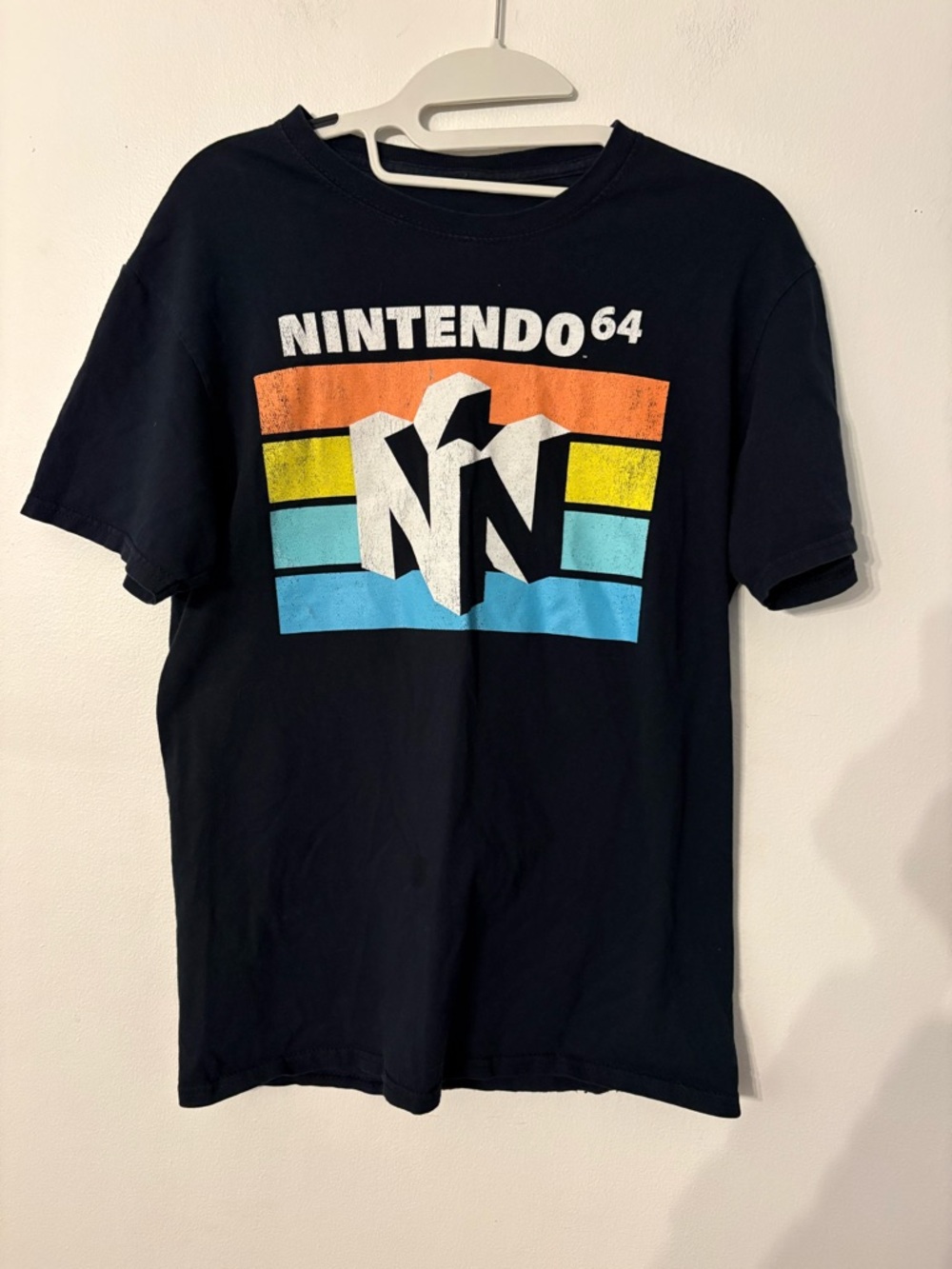 Nintendo Black Tee with Orange Yellow and Light Blue Retro Stripes